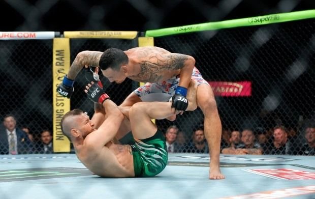 Comeback  Conor McGregor Hanya Bertahan 69 Detik di UFC 329 Holloway Menang TKO
